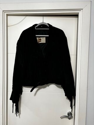 Chaqueta ante AMI International London.