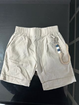 Pantaloncino bimbo beige con laccetto