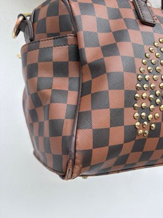 Borsa Sprayground marrone con borchie oro