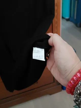Jersey sin mangas cuello alto negra