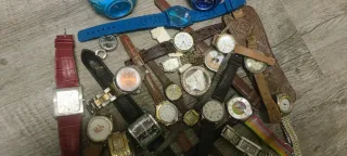 Lote de23  relojes de muchos relojes 