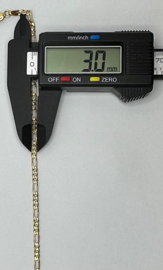 Cadena Figaro de oro de 18k, 11.48 g, 62 cm.