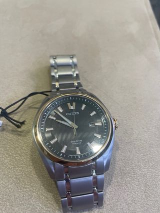Reloj Citizen Eco-Drive Titanio Negro Dorado