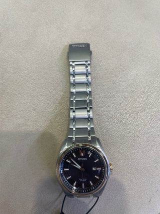 Reloj Citizen Eco-Drive Titanio Negro Dorado