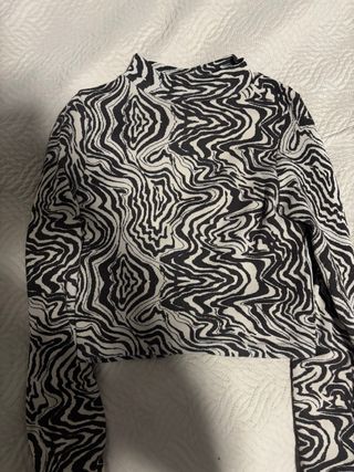 Jersey cuello vuelto estampado cebra