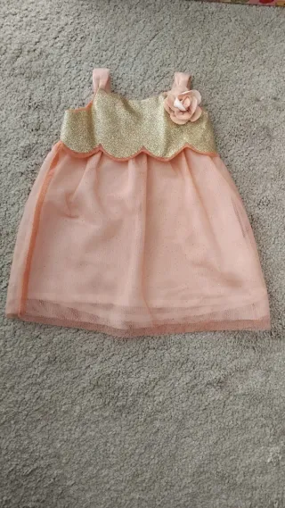 Vestido para muñeca rosa con flor