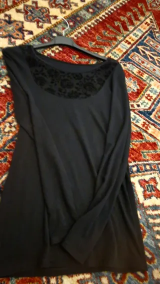 Maglia nera elegante maniche lunghe