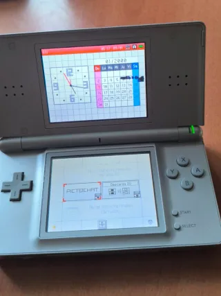 Nintendo DS Lite Plata + 4 Juegos
