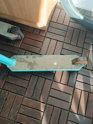 Patinete freestyle azul y naranja