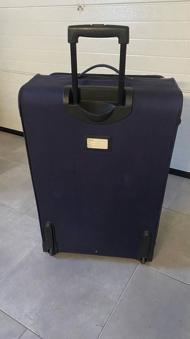 Maleta grande azul con ruedas