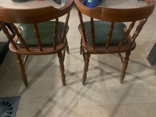 Coppia di poltrone vintage in legno e pelle