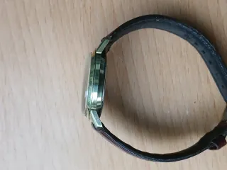 Reloj Bulova Automático Dorado y Marrón
