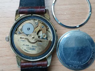 Reloj Bulova Automático Dorado y Marrón