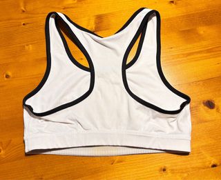 Top deportivo Puma blanco plateado Talla M