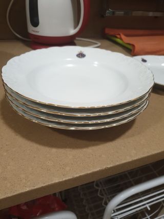 Juego de 12 platos de porcelana blancos y dorados