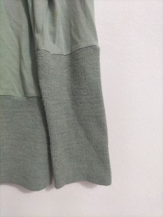 Jersey verde con dibujo de niña
