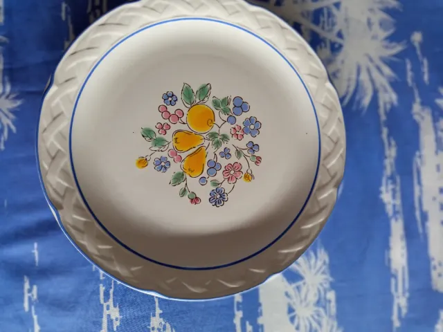 5. Platos de porcelana con flores azules DISEÑÓ S