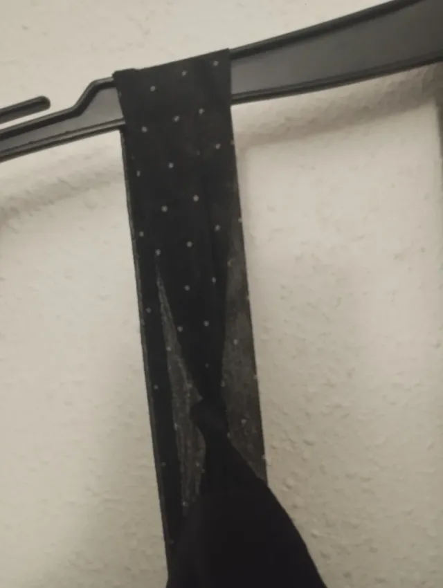 Top largo negro de gasa con estampado blanco