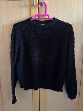 Jersey negro peludo
