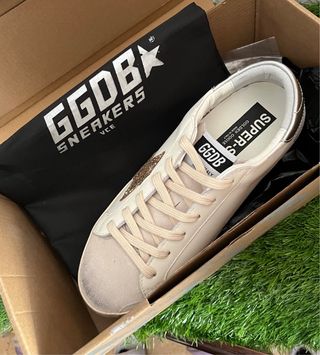 Golden Goose Zapatillas Blancas y Doradas taras