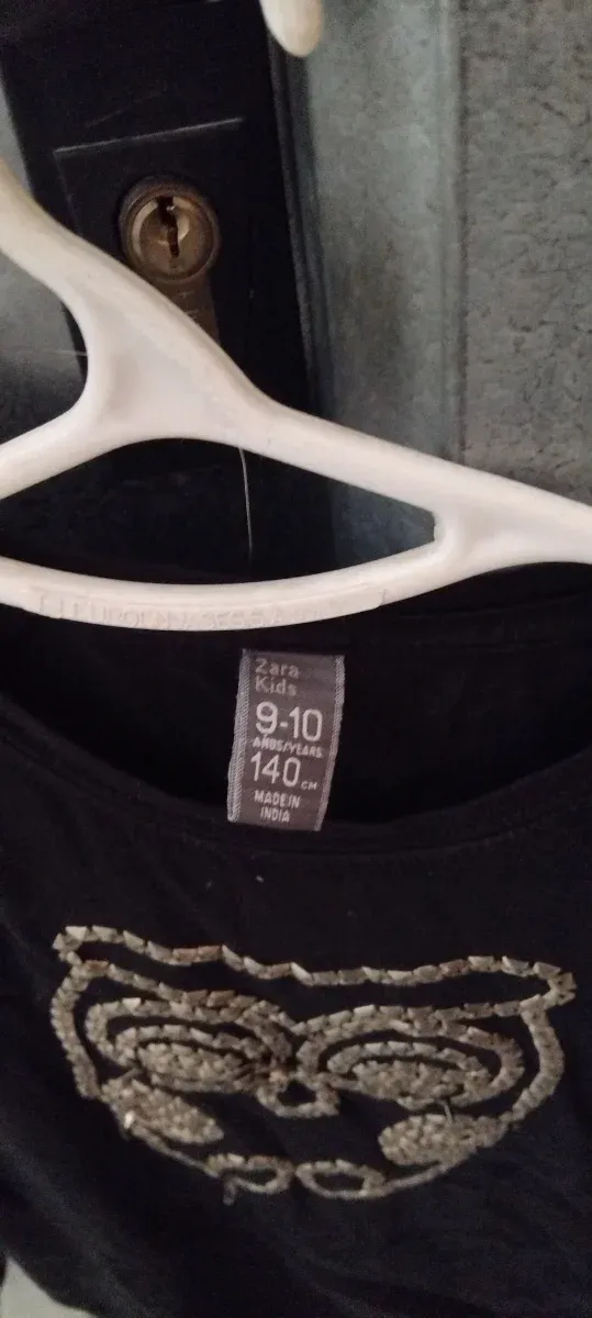 Camiseta negra buho lentejuelas 9-10 años