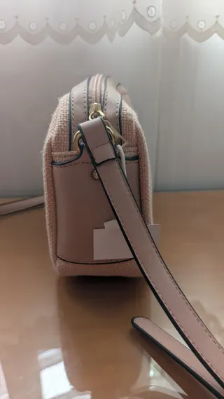 Bolso rosa tipo bandolera