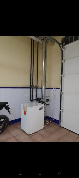 Caldera Roca, depósito 1000L + Chimenea Inox
