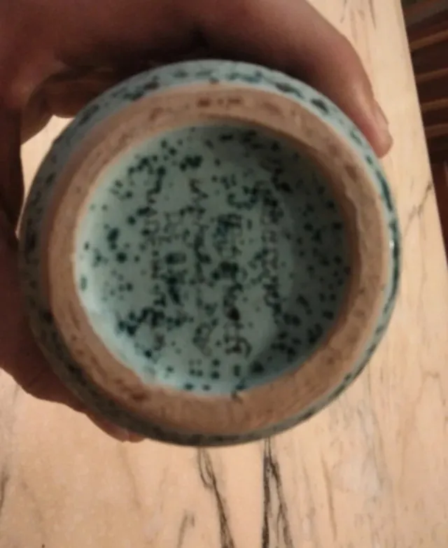 Bottiglia in terracotta antica decorata