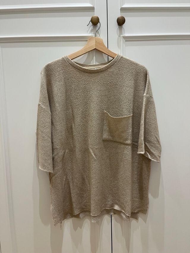 Jersey beige con bolsillo