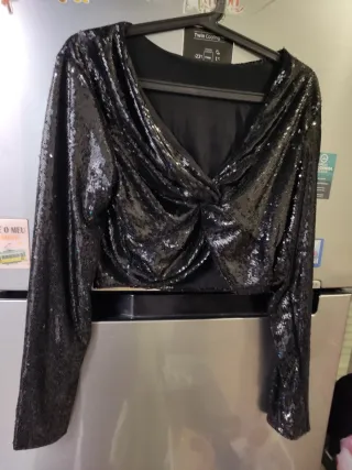 Blusa brillante manga larga