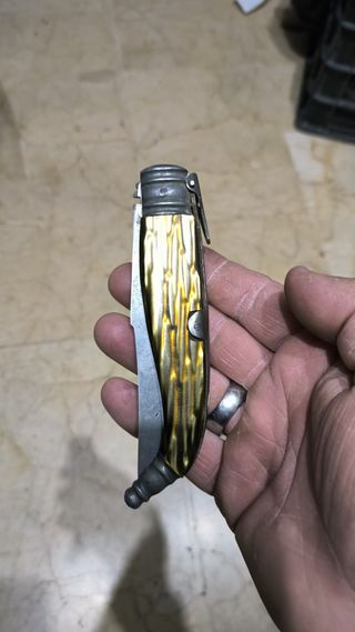 Funda de navaja antigua dorada