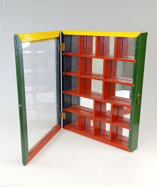 Teca esposizione legno e vetro