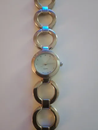 Reloj Avon Vintage Plata y Blanco