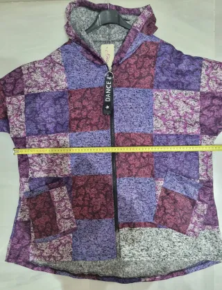 CHAQUETA CON CREMALLERA PATCHWORK.