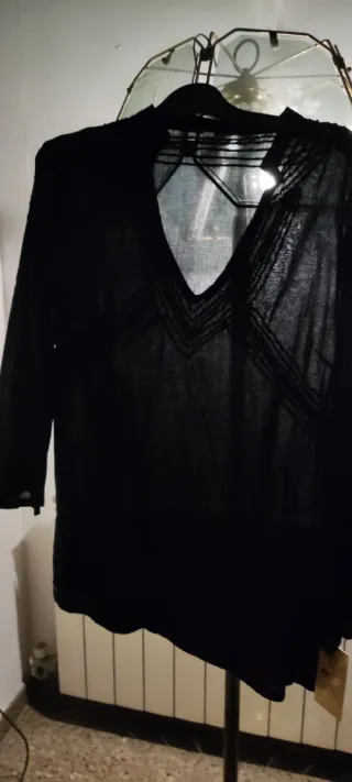 Blusa tipo casaca negra