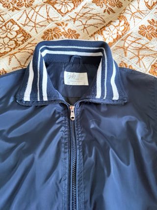 Giubbotto donna blu con zip e tasche