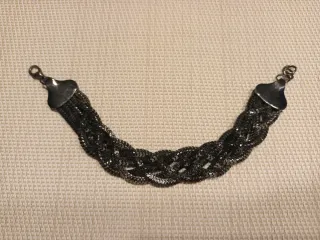 Pulsera trenzada plata y negro