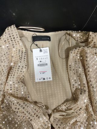 Blusa dorada lentejuelas escote