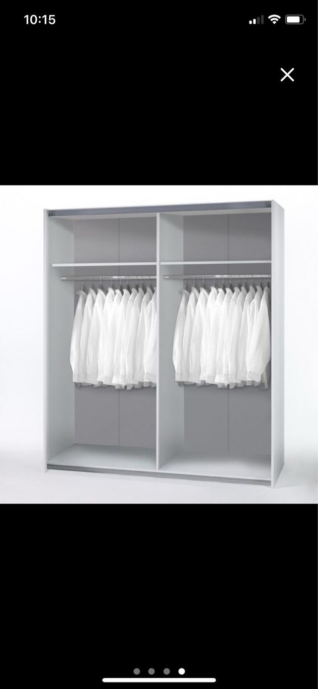 Armario puertas correderas madera y blanco