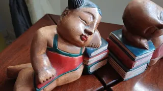 Fermalibri in legno bambini che dormono