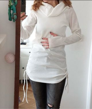 Jersey blanco cuello alto drapeado
