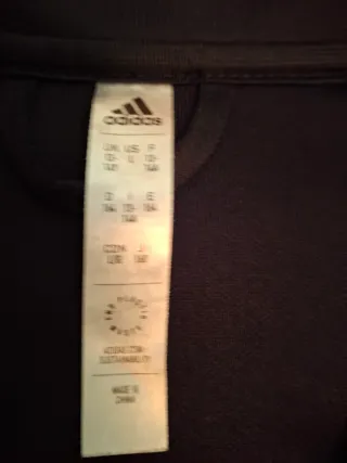 Chándal Adidas FPA T14 Negro Naranja.
