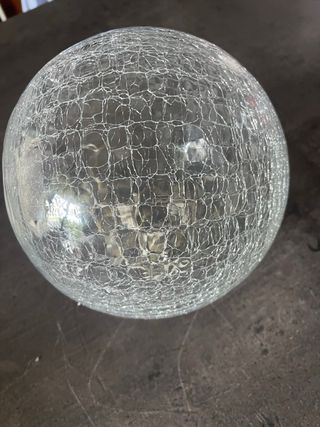 Palla di vetro con lucine dorate