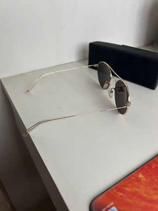 Gafas de sol hombre STING doradas y negras