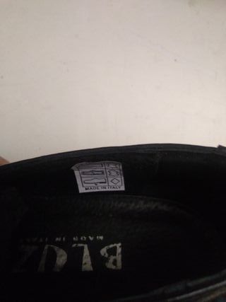 Bluzi Nere in pelle con fibia