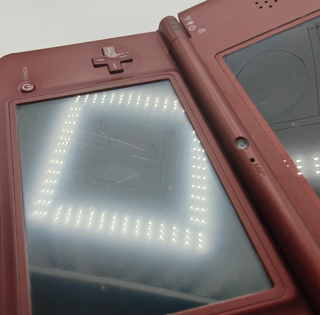Nintendo DSi XL Rossa - Rotta