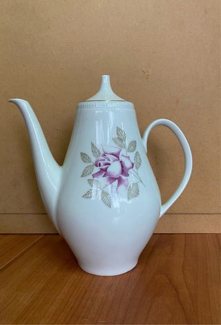 Teiera in porcellana con rosa