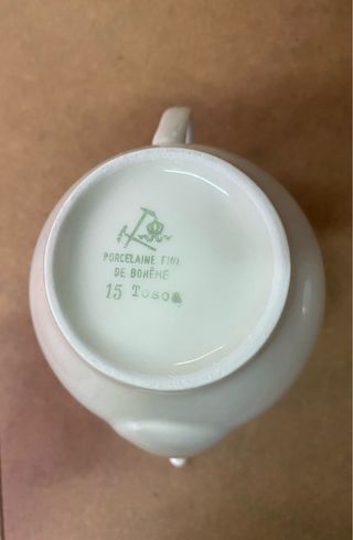 Teiera in porcellana con rosa