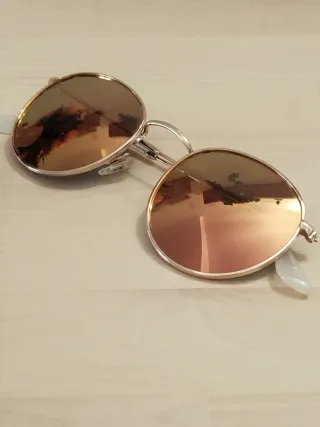 Gafas de sol Hawkers doradas y rosas