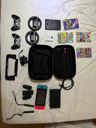Nintendo Switch + Accesorios y Juegos